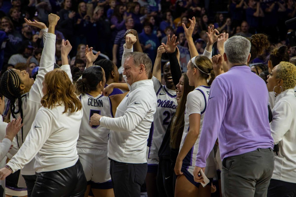 Head coach Jeff Mittie breaks it down with his players following K-State's win. No. 12 K-State beat No. 10 Texas 61-58 Jan. 13, 2024. 