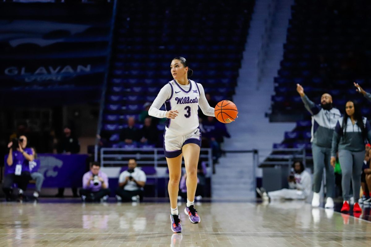 Guard Jaelyn Glenn dribbles down the court in the 79-37 win against Jackson State. Glenn led K-State in scoring on the day with 13 points.