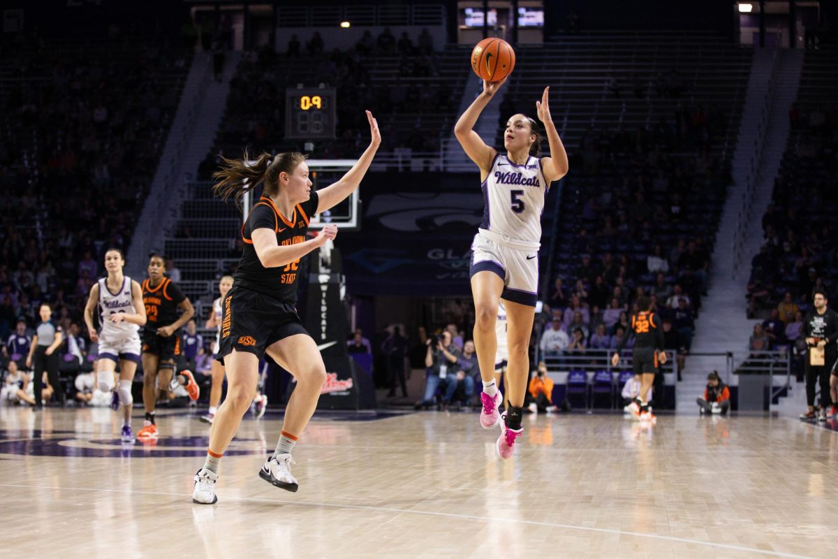 Guard Serena Sundell attempts to block a shot against Oklahoma State in K-State's 69-68 victory. The Wildcats followed up the close win with a 96-93 double overtime loss to Iowa State.