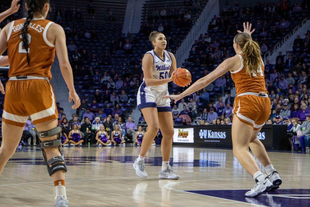 Center Ayoka Lee gives the bucket a look in the Texas game on Jan. 13, 2024. In her comeback game against Iowa State, Lee dropped 20 points with six rebounds in the 96-93 double overtime loss.