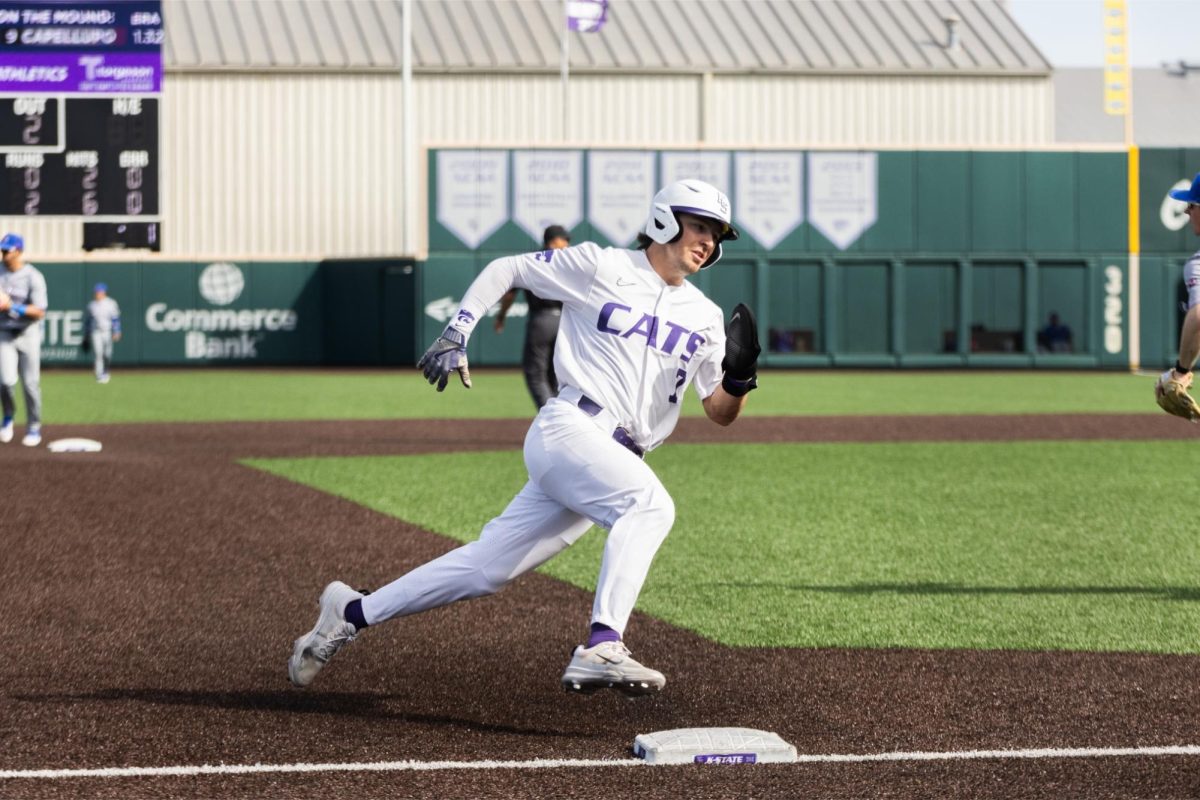 Second baseman Brady Day runs the bases against UMass Lowell March 3. Against Clemson, Day had two hits and one RBI in K-State's 8-3 loss.