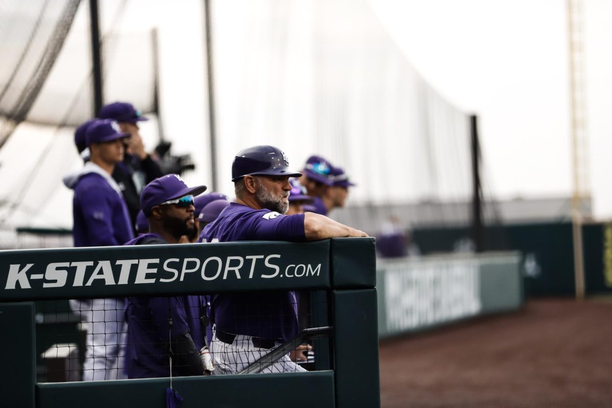 Head coach Pete Hughes watches his players against Oklahoma State on April 1, 2022, at Tointon Family Stadium. With winning Game 1 in the series against Houston, Hughes notched his 800th career win. (Archive photo)