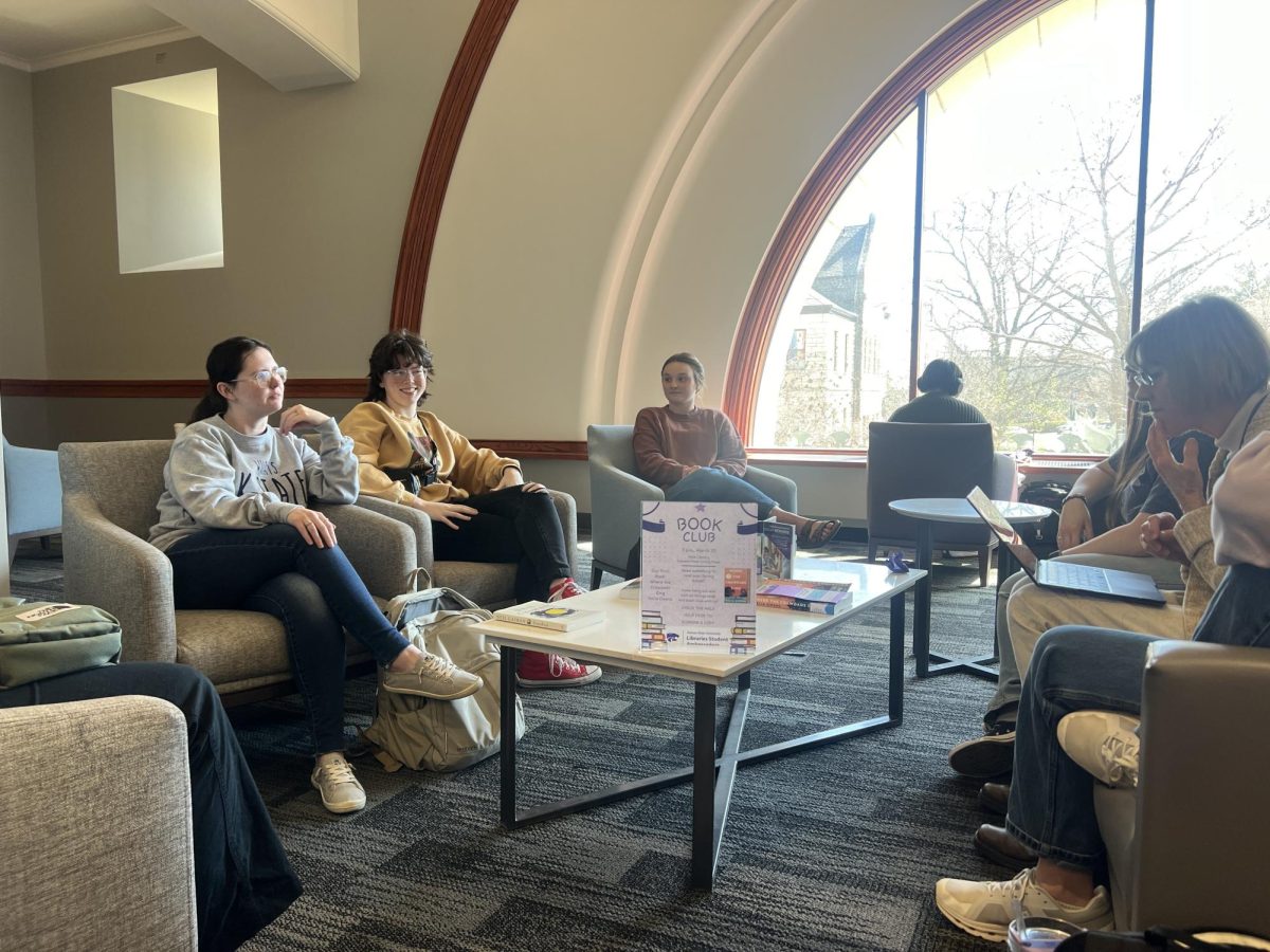 Seven students gather to discuss the book "Where the Crawdads Sing" by Delia Owens at the first book club meeting at Hale Library. The first meeting took place on March 20.