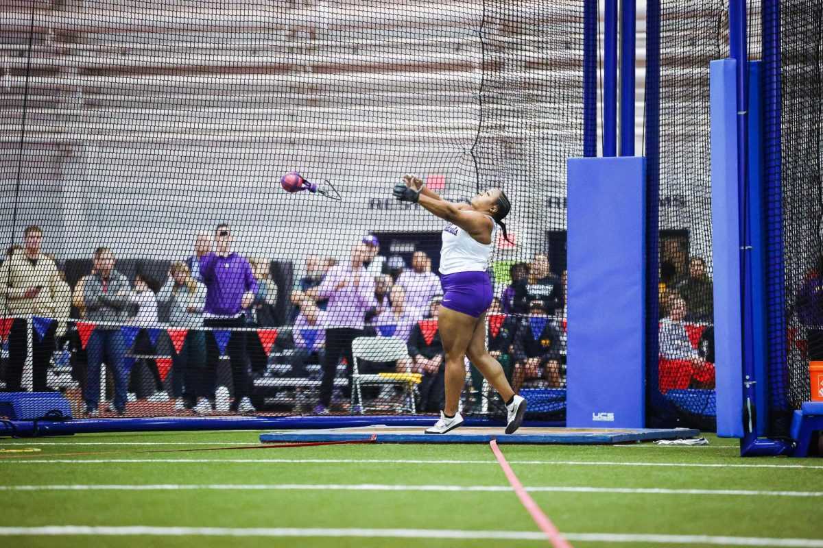 Thrower Monique Hardy participates in the weight throw at the KU-KSU-WSU Triangular on Jan. 12. Hardy set the weight throw school record at the event, reaching 22.13m/72-7.25, eight inches further than her previous best of 21.93m/71-11.5. (Photo courtesy of K-State Athletics | Austin VanMeter)