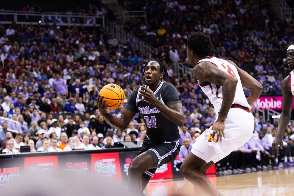 Forward Arthur Kaluma drives to the basket against Iowa State in the Big 12 tournament quarterfinals. In K-State's 76-57 loss to the Cyclones, Kaluma has 13 points and five rebounds.