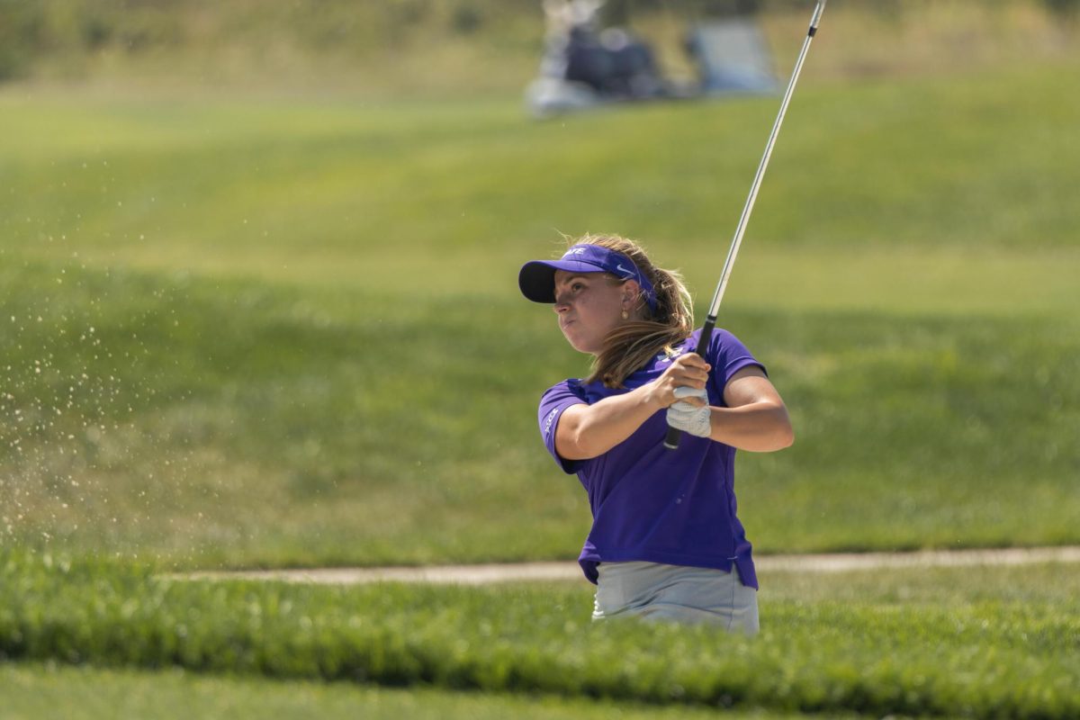 Junior Carla Bernat practices out of the bunker at Colbert Hills. Bernat will compete in the NCAA Regionals at Traditions Club, May 6-8.