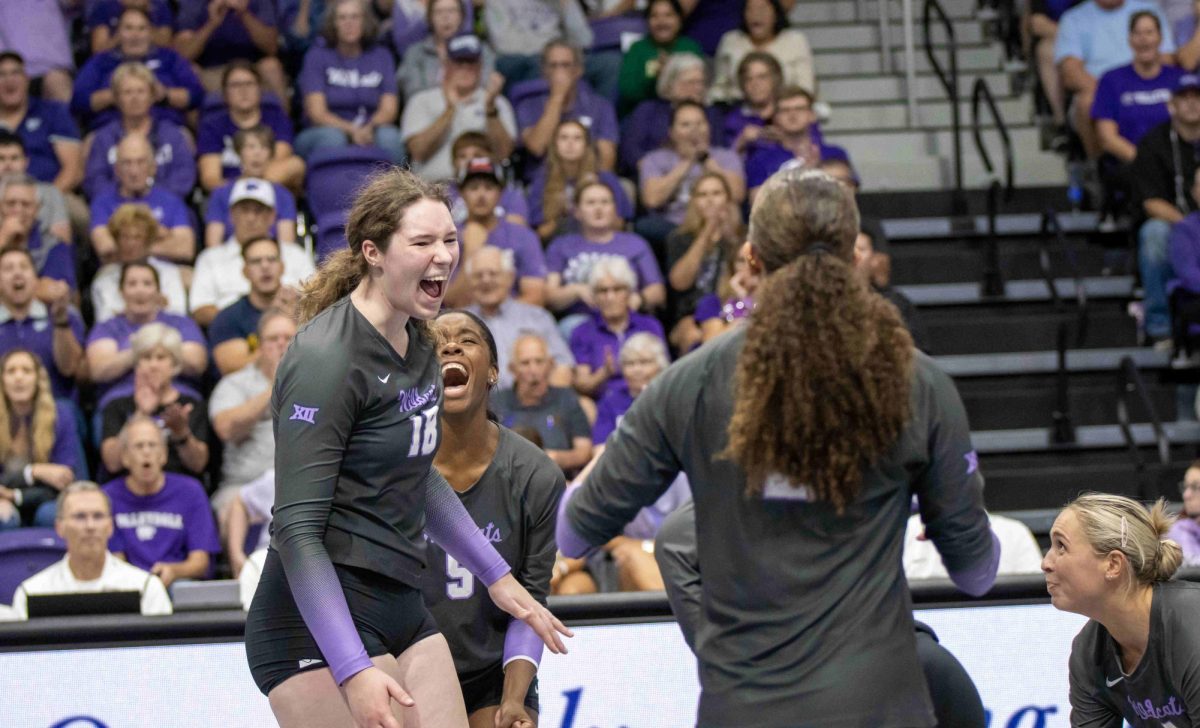 Blocker Brenna Schmidt is filled with emotion as she scores a point. The Wildcats defeated the Horned Frogs in a 5-set thriller 3-2 on Sept. 22 at Morgan Family Arena. 