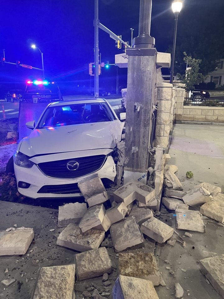 Police were called in at 12:20 a.m. after a white Mazda collided with an outer pillar. (Photo courtesy of St. Isidore's)