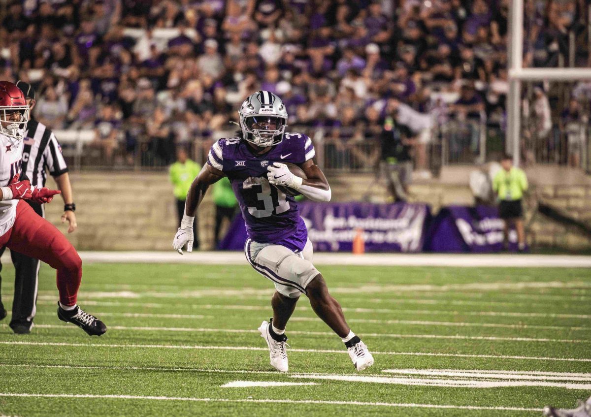 Running back DJ Giddens in open space in K-State's Friday night matchup with Arizona on Sept. 13, 2024. K-State won the battle of the Wildcats in its first matchup as conference foes. 