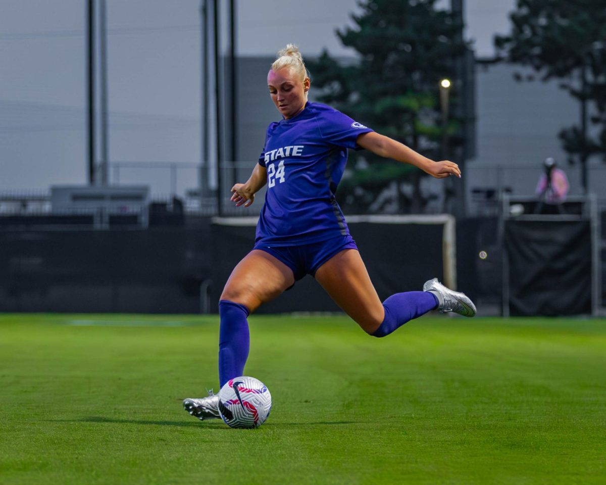 Sophomore Jericho Frigon strikes a ball against Colorado on Sept. 12, 2024, at Buser Family Park. K-State lost 1-0. 