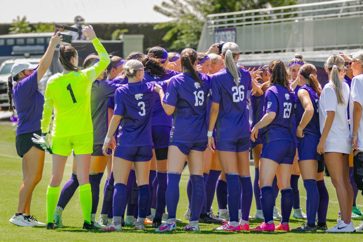 K-State huddles together ahead of its matchup with South Dakota. The Wildcats won 3-0 in their senior day matchup on Sept. 1. 