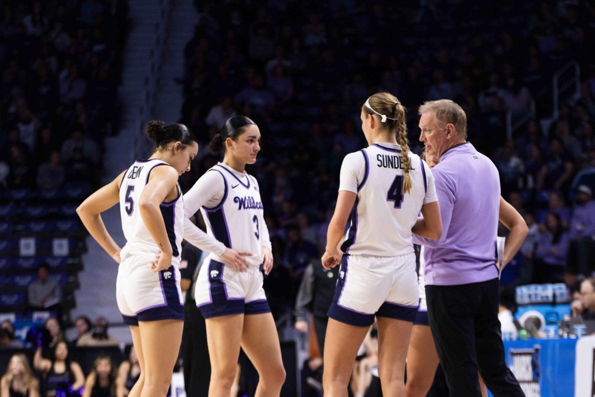 Head coach Jeff Mittie talks with his players as the Wildcats take on the Portland Pilots in the round of 64. K-State won 78-65 at Bramlage Coliseum on March 22. 