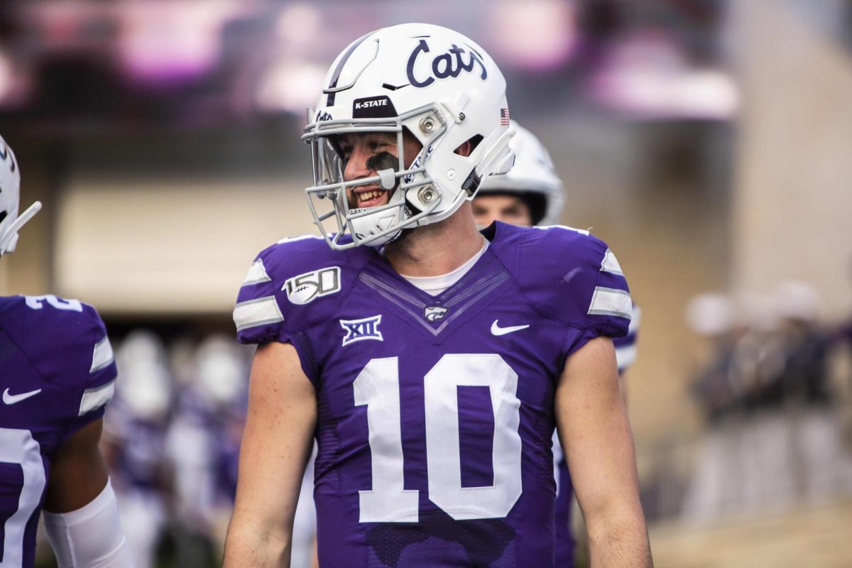 Junior quarterback Skylar Thompson walks out onto the field before K-State's football game against West Virginia at Bill Snyder Family Stadium on Nov. 16, 2019. The Wildcats lost to the Mountaineers with a final score of 24-20. (Archive photo by Logan Wassall | COLLEGIAN MEDIA GROUP)