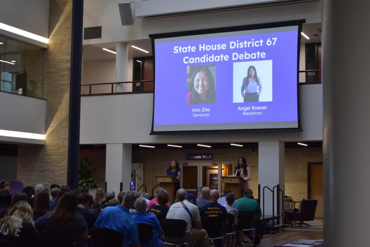 Kim Zito and Angel Roeser debate over numerous topics at K-State Union Courtyard.