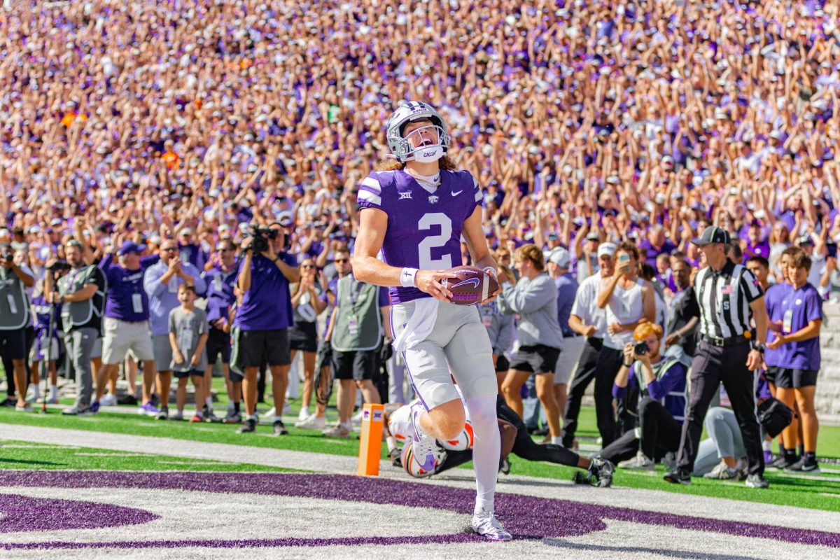 Quarterback Avery Johnson scores a touchdown against OSU on Sept. 28. K-State won 42-20.