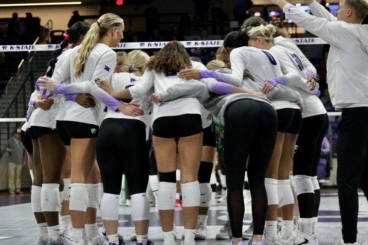 K-State volleyball huddles during its matchup with Baylor on Nov. 13. K-State lost in a sweep