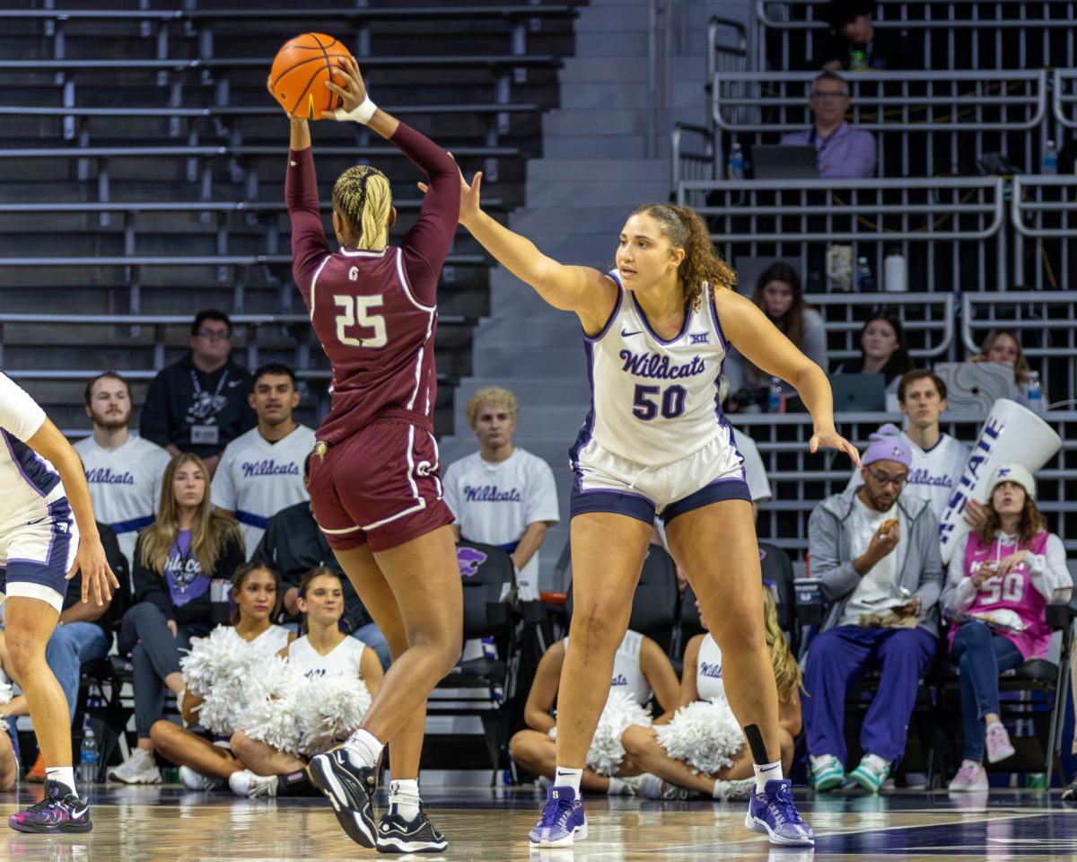 Center Ayoka Lee guards a Little Rock player in No. 10 K-State's 30-point win on Monday, Nov. 18. Lee moved into second on K-State women's basketball's all-time scoring list. 