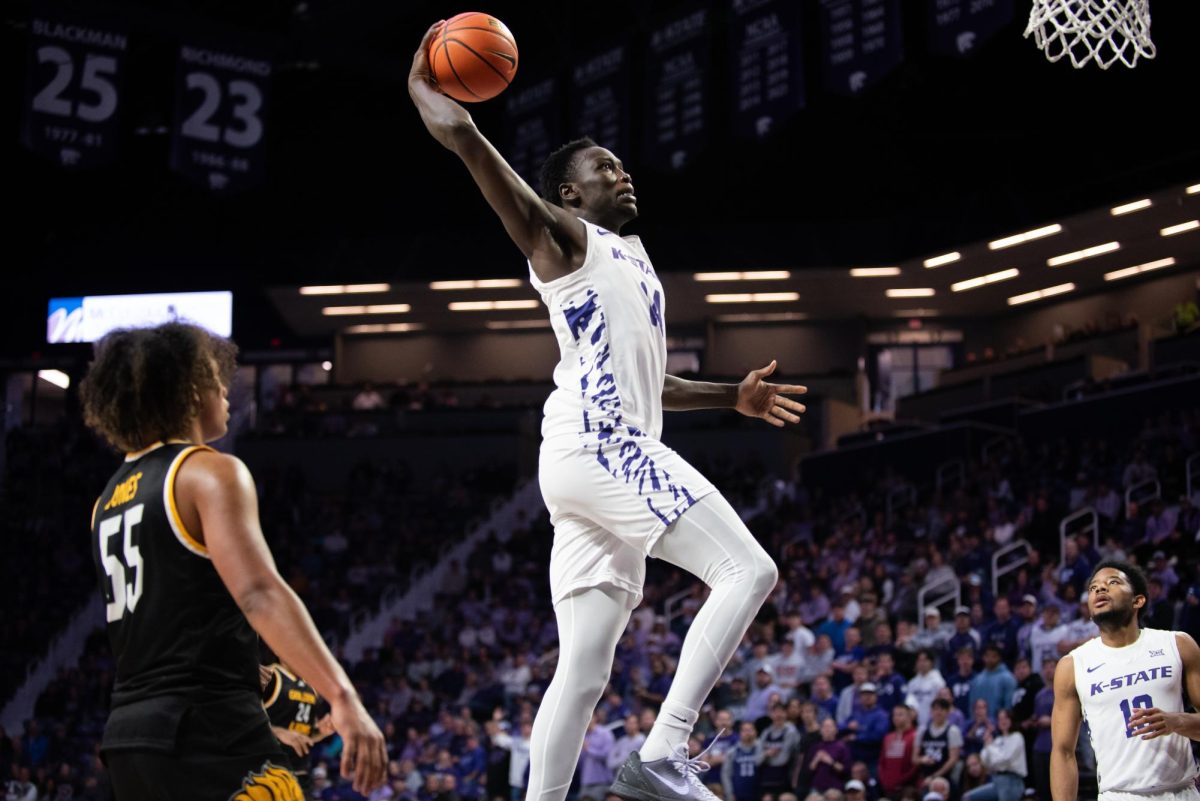 Forward Achor Achor slams home a dunk on Dec. 1 against Arkansas Pine Bluff. The Wildcats set a program record of 120 points, led by Achor's season-high 21 points.