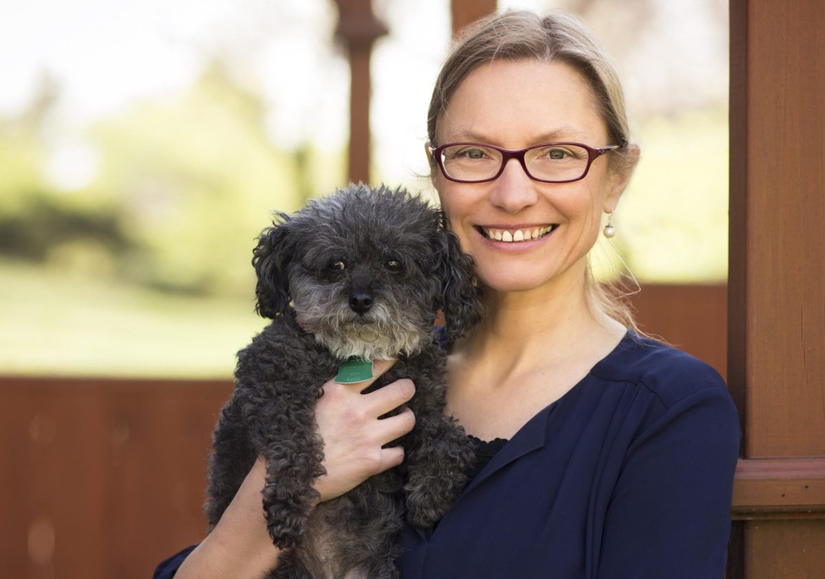 Lisa M. Pohlman received the Iman Outstanding Faculty Award for teaching. She is also involved in volunteer work around Manhattan, including serving as the president and medical director of the Riley County Humane Society.